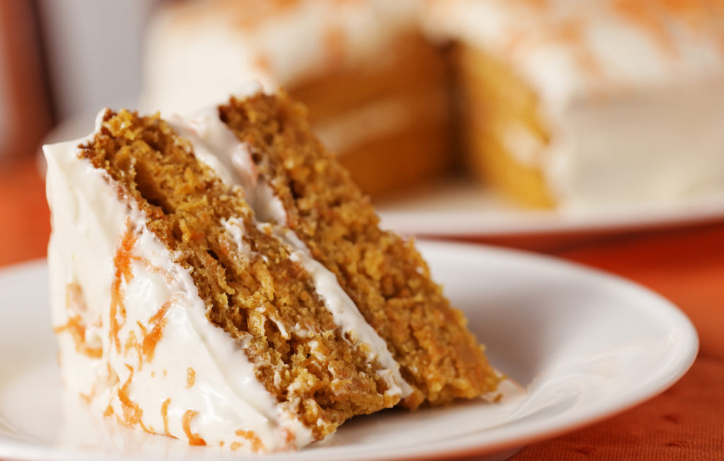 Homemade sweet potato cake dessert on white plate.